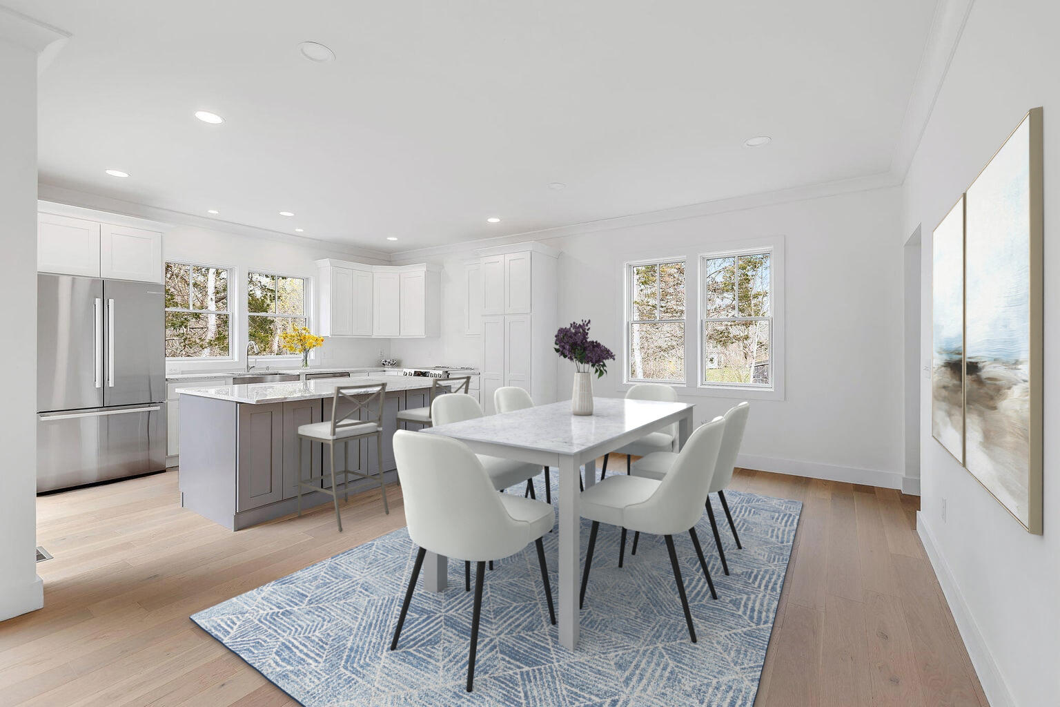 66 Doane Road Harwich Port, MA 02646 - Photo 4 of 40 a kitchen with a dining table chairs and refrigerator