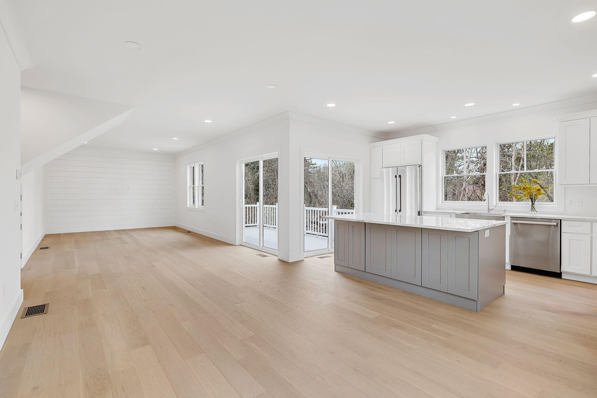 66 Doane Road Harwich Port, MA 02646 - Photo 5 of 40 a large kitchen with a lot of counter top space and stainless steel appliances