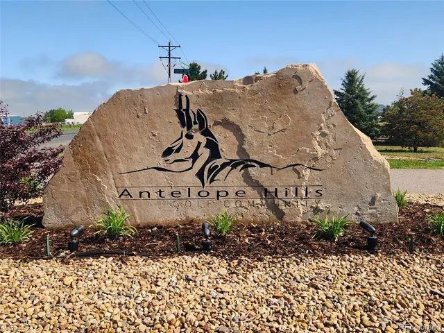 a sign on the side of a road