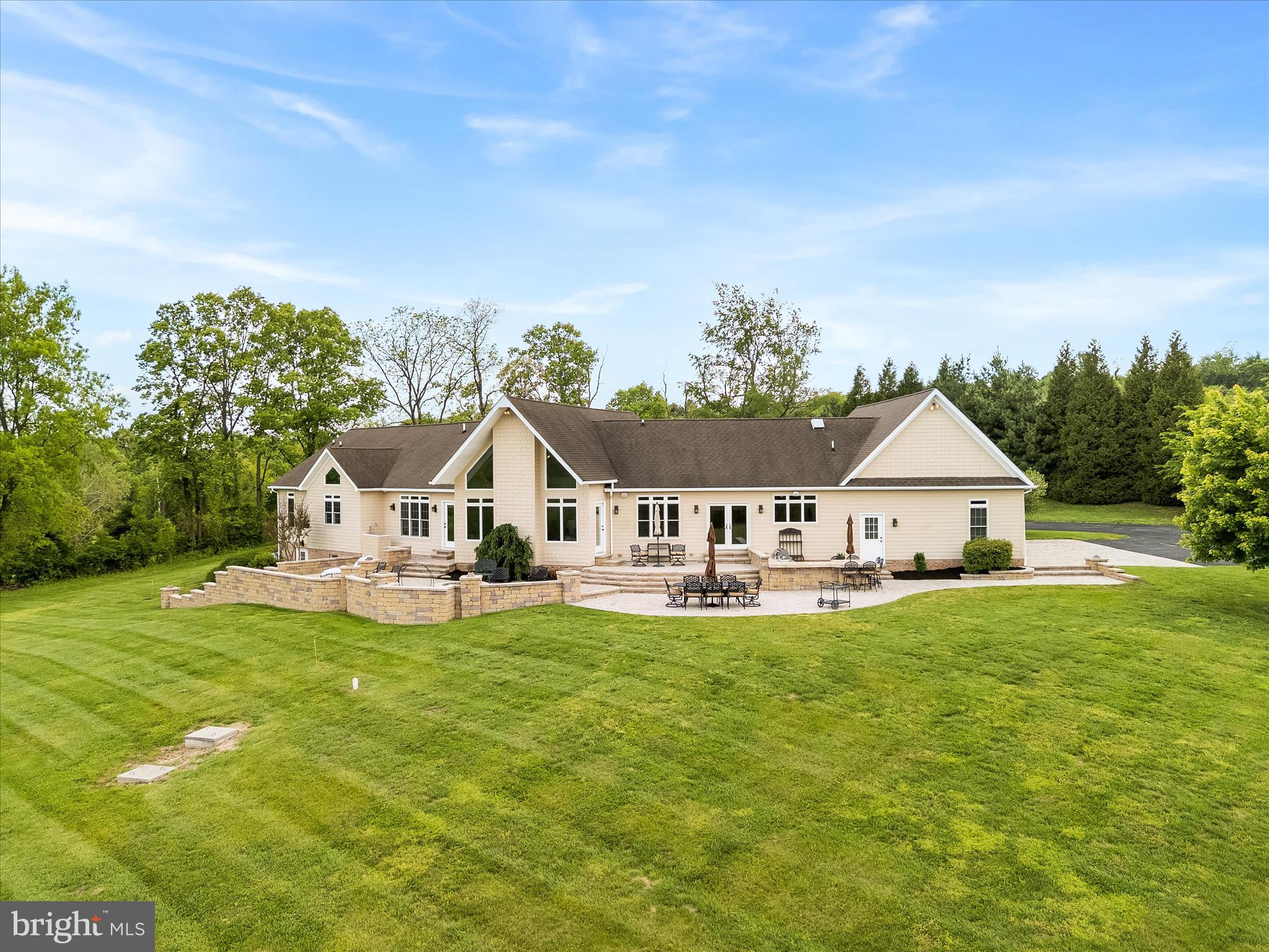 10691 Easterday Road Myersville, MD 21773 - Photo 62 of 79 an white house with a big yard and large trees
