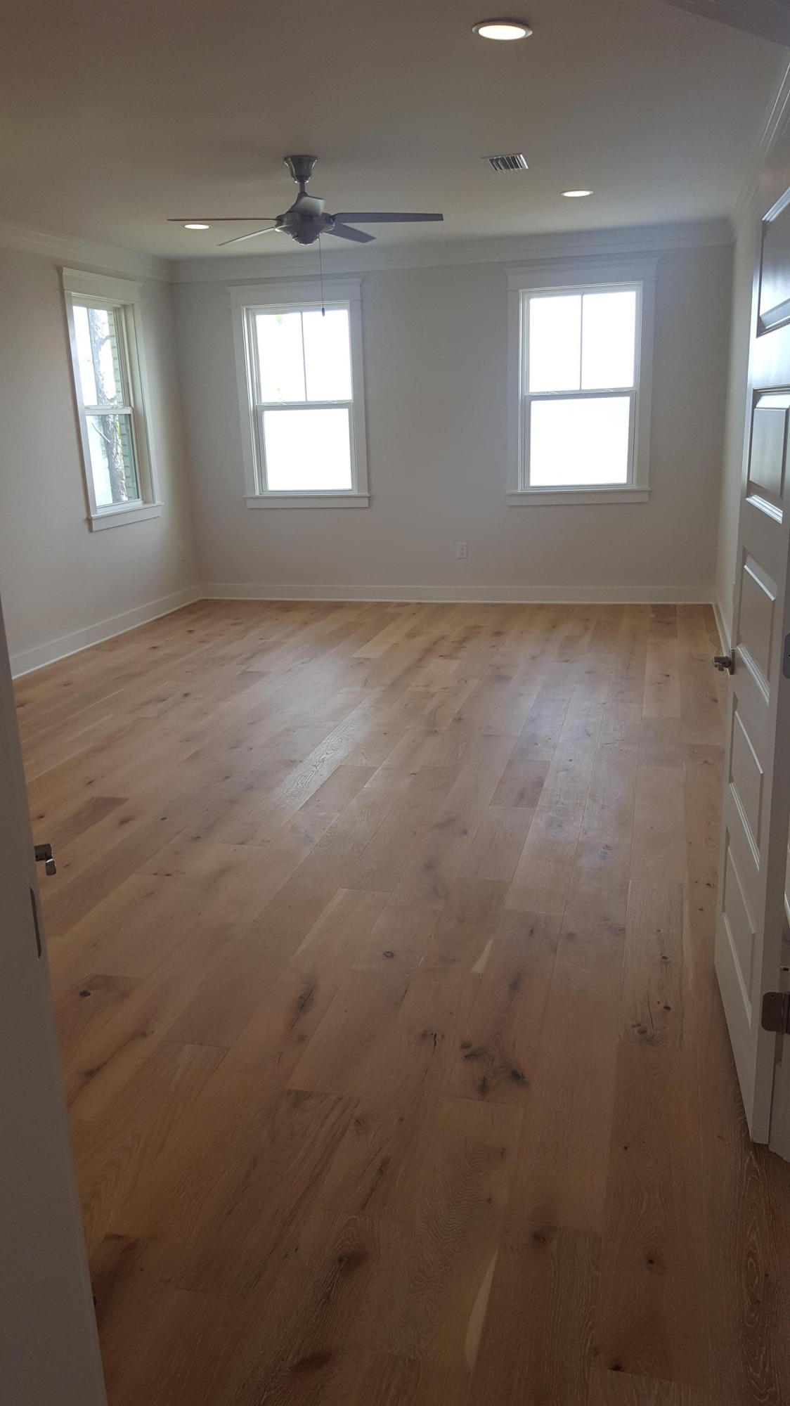 1477 Driftwood Point Road Santa Rosa Beach, FL 32459 - Photo 11 of 15 an empty room with windows and closet