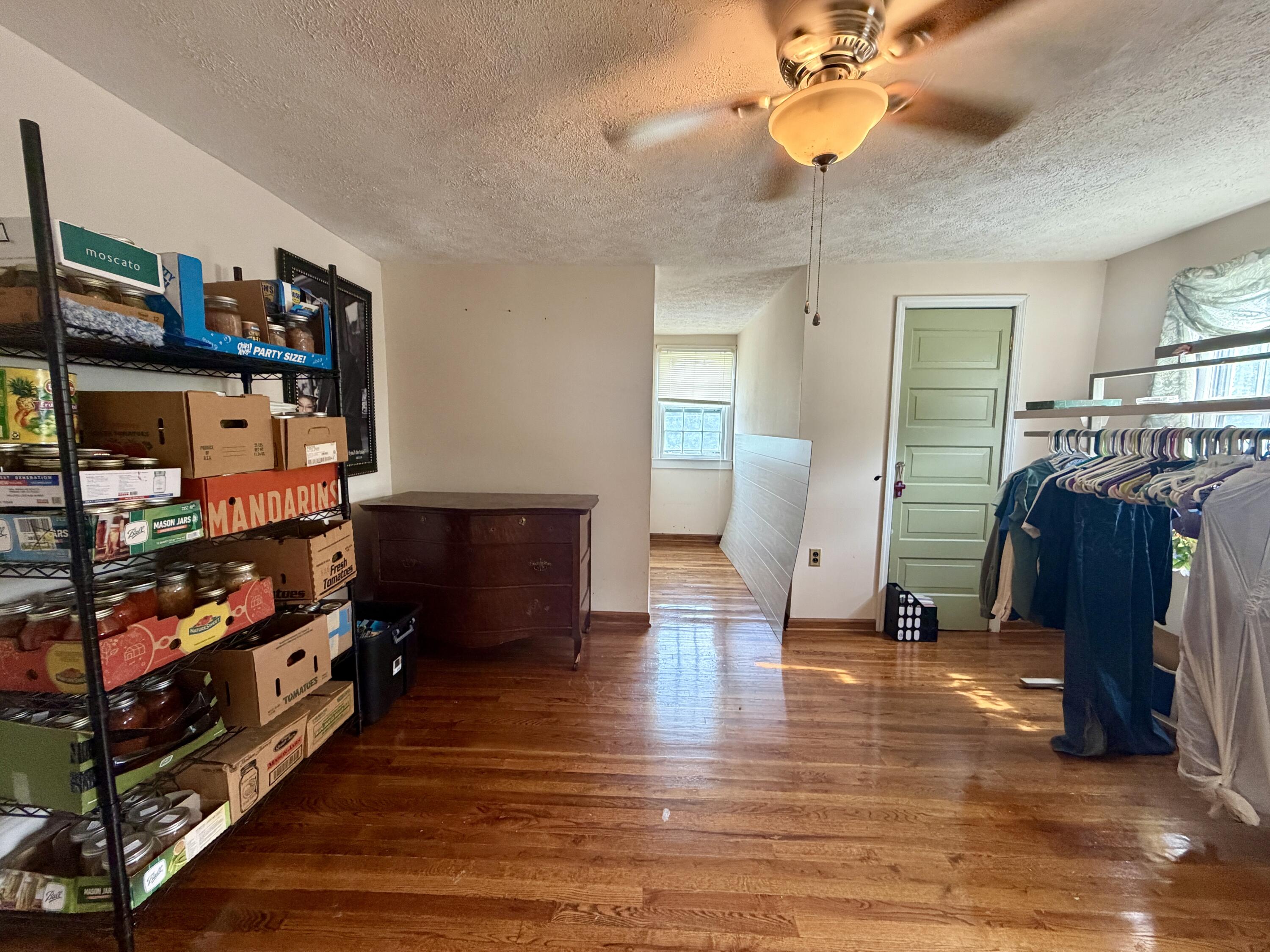 1491 Jones Ridge Road Axton, VA 24054 - Photo 12 of 17 a living room with furniture and a wooden floor