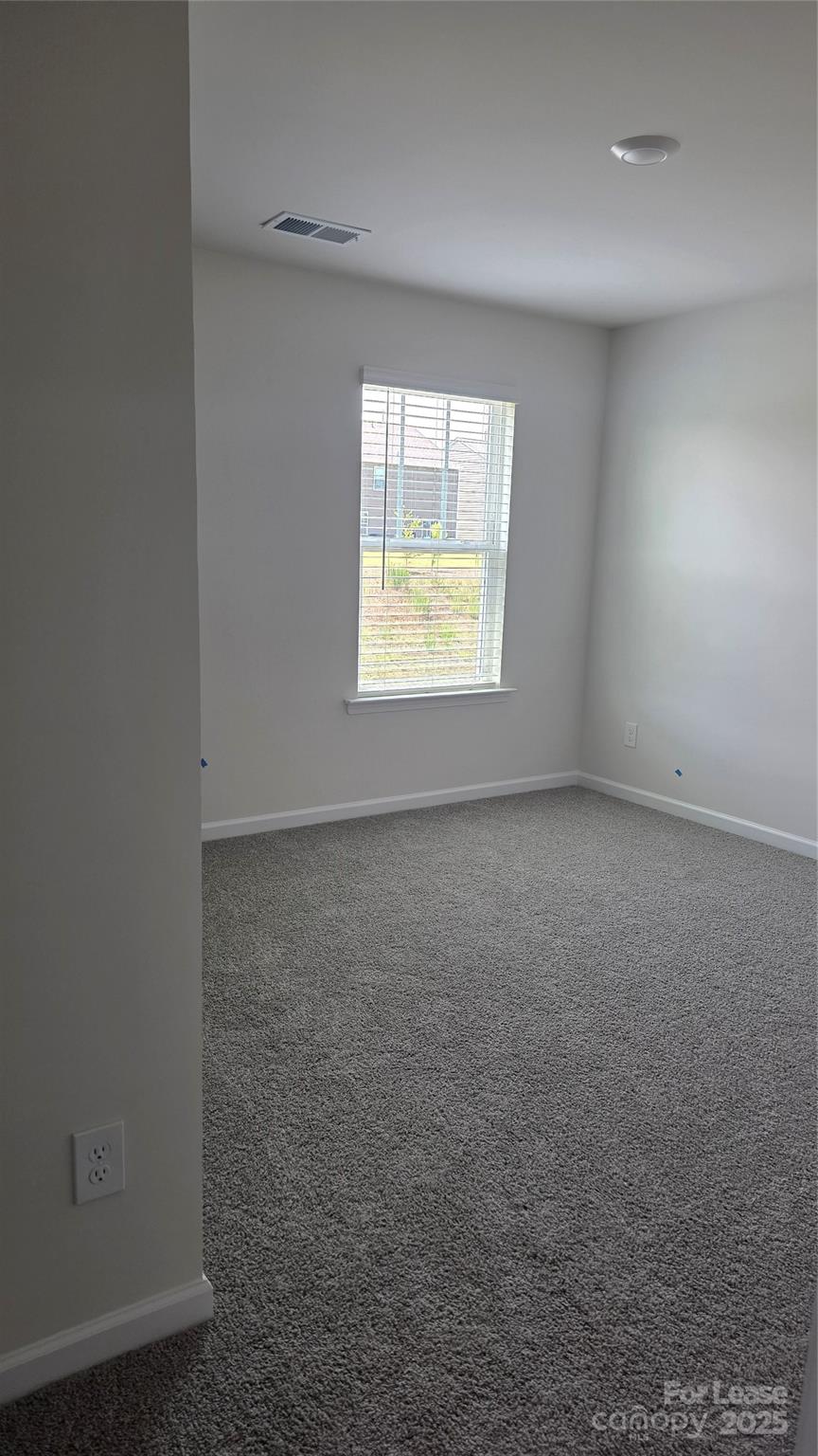 1345 Secrest Cmns Drive Monroe, NC 28112 - Photo 15 of 19 an empty room with a window