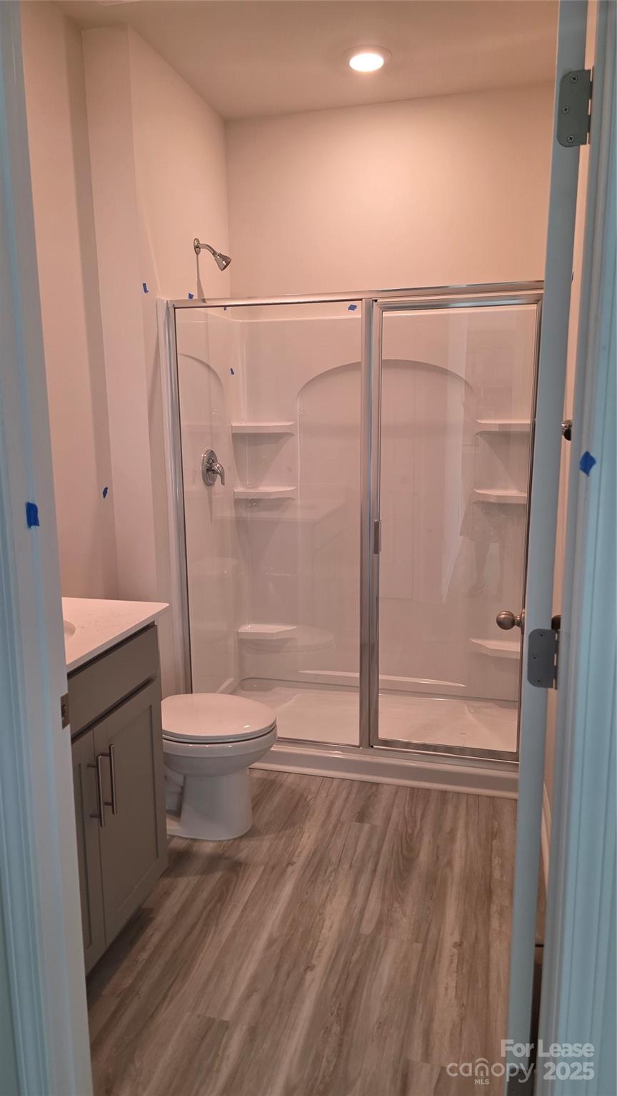 1345 Secrest Cmns Drive Monroe, NC 28112 - Photo 8 of 19 a bathroom with a shower a toilet and sink