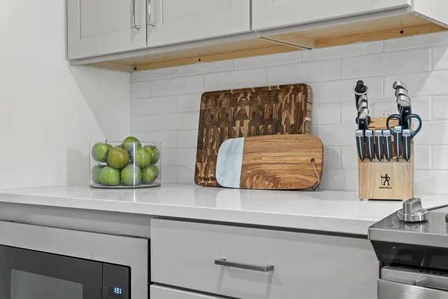 a bathroom with a sink and mirror