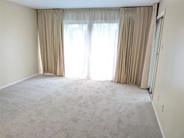 a view of a livingroom with a furniture