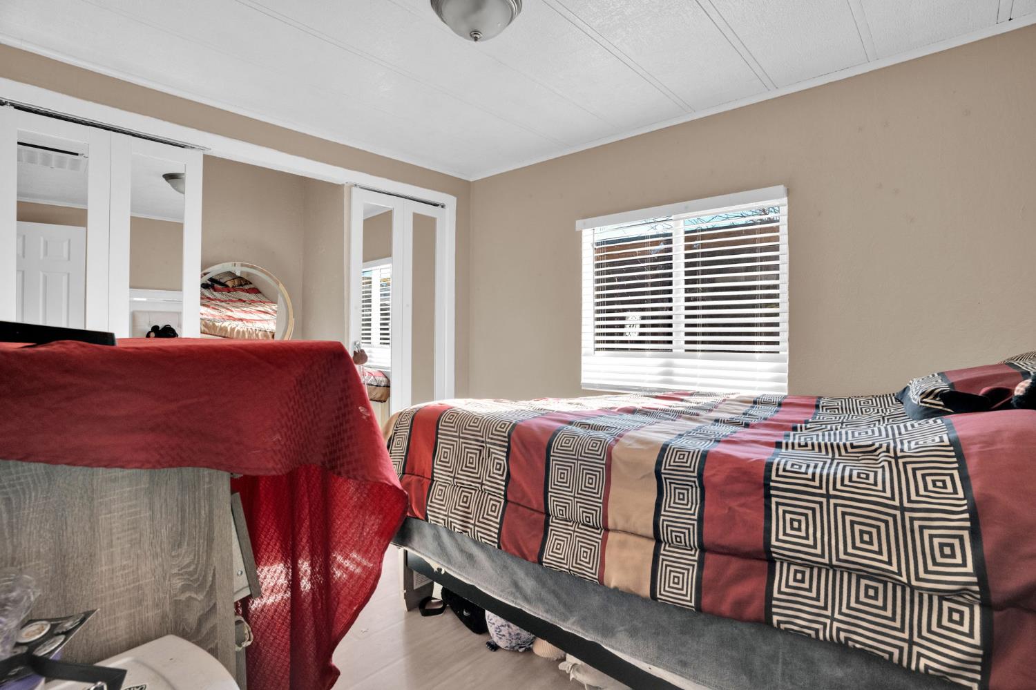 3707 Farmington Road, Unit 2 Stockton, CA 95215 - Photo 14 of 21 a bedroom with a bed and window