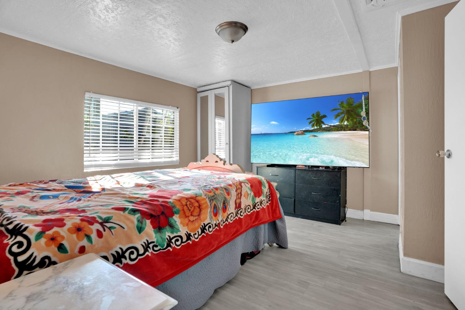 3707 Farmington Road, Unit 2 Stockton, CA 95215 - Photo 16 of 21 a bedroom with a bed and a window