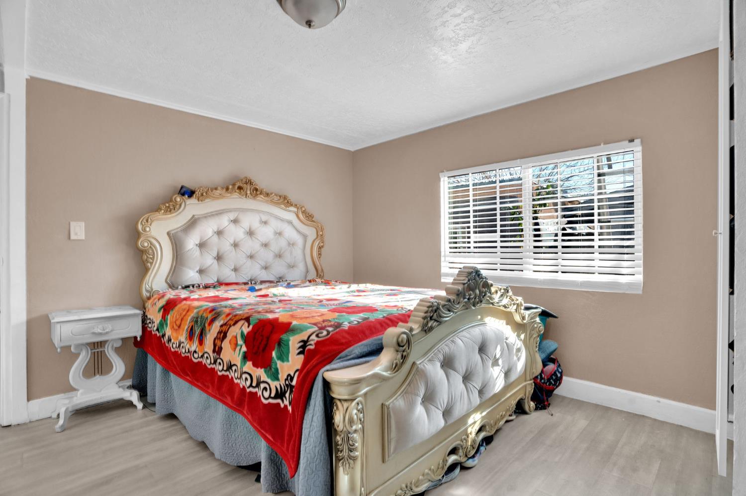 3707 Farmington Road, Unit 2 Stockton, CA 95215 - Photo 18 of 21 a bedroom with a bed and a window