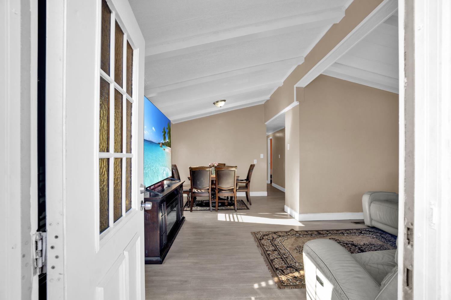 3707 Farmington Road, Unit 2 Stockton, CA 95215 - Photo 5 of 21 a living room with furniture stove and a window