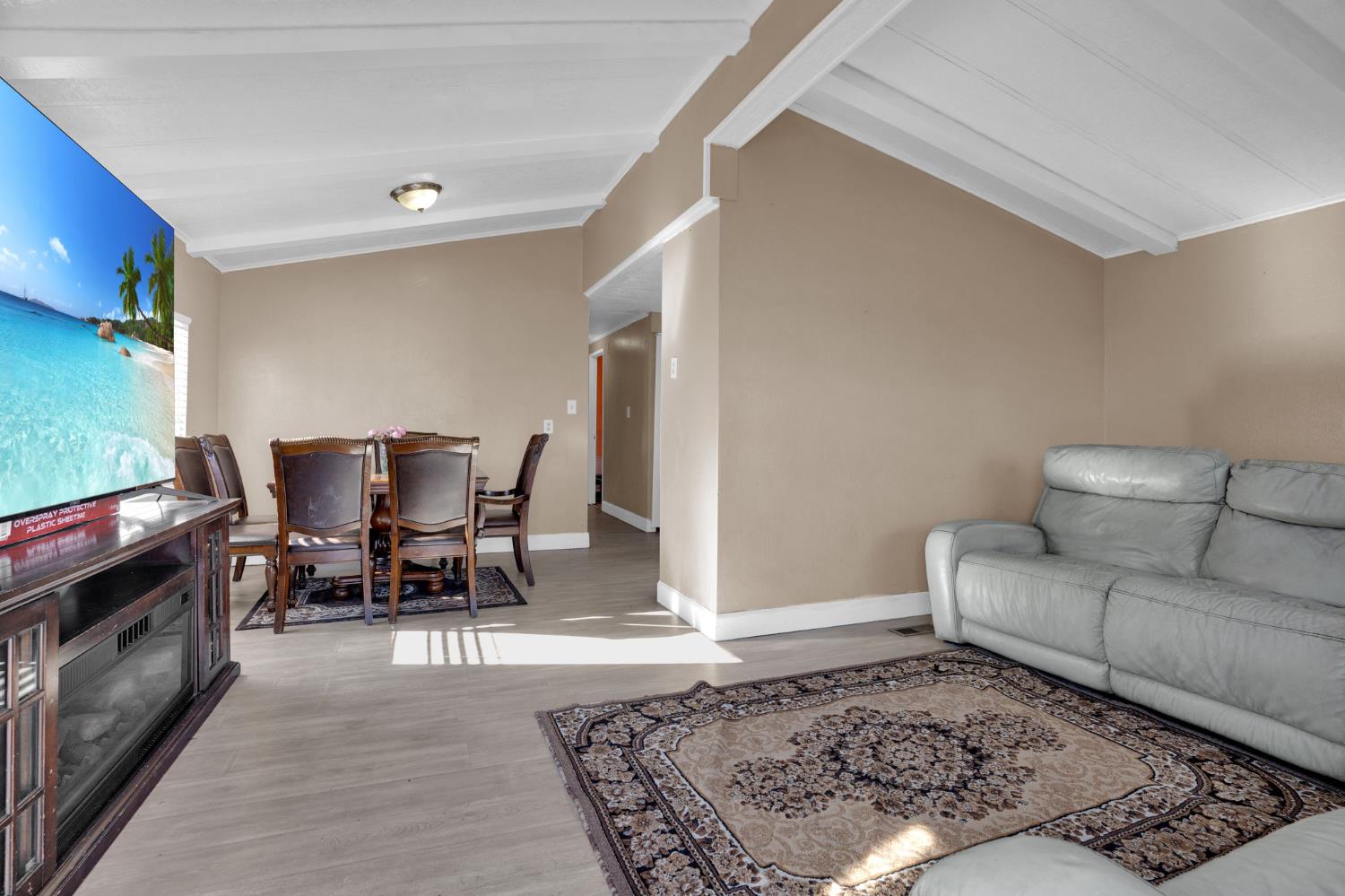 3707 Farmington Road, Unit 2 Stockton, CA 95215 - Photo 6 of 21 a living room with furniture and a rug