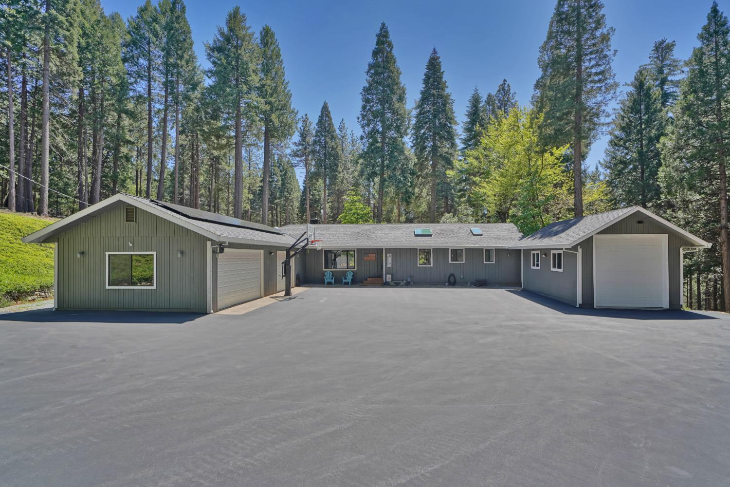 4 bedroom, three bath, home on 10 usable acres. RV Van garage and two more garages all with auto garage door openers.