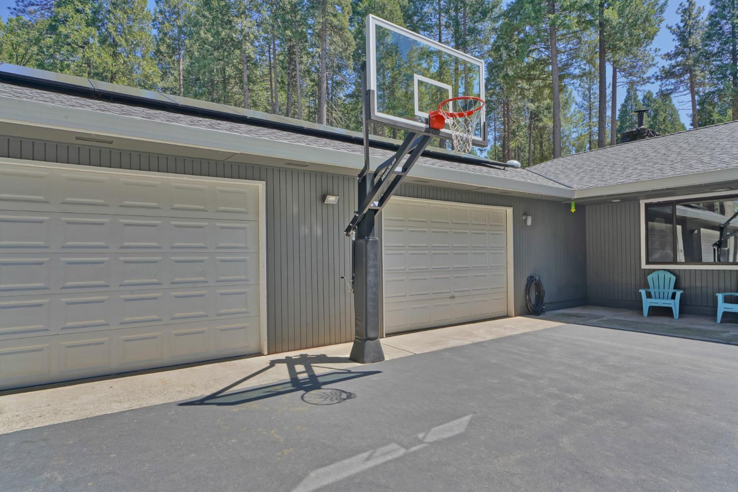 2320 Old Blair Mill Road Pollock Pines, CA 95726 - Photo 28 of 45 Mega Slam basketball hoop, cemented into ground.