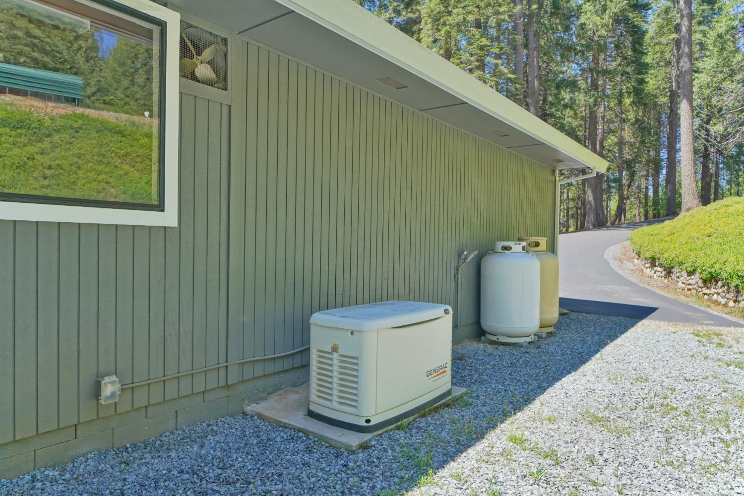 2320 Old Blair Mill Road Pollock Pines, CA 95726 - Photo 36 of 45 Generac generator with two rented propane tanks,