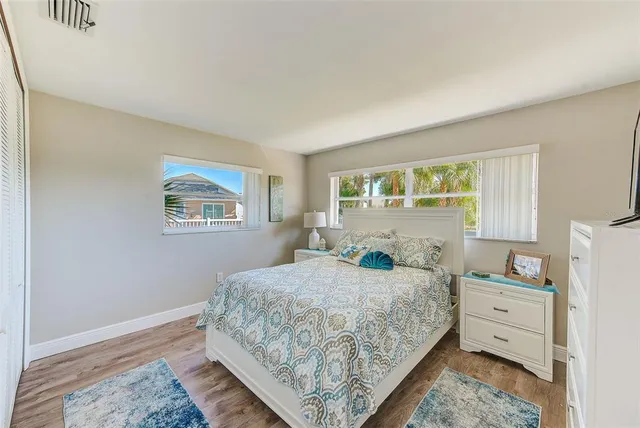 a bedroom with a bed and a closet