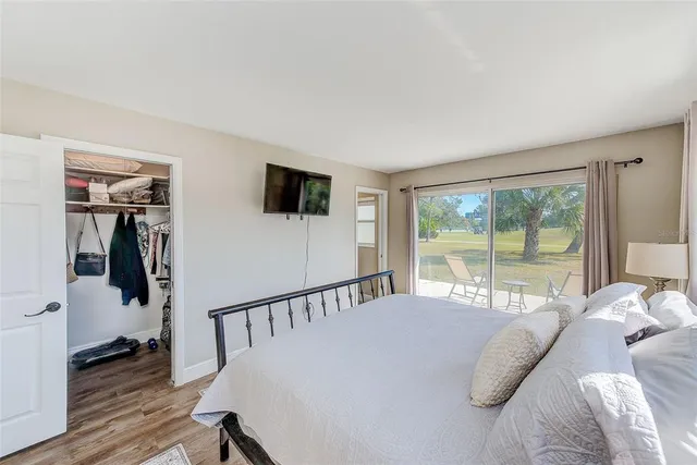 a bathroom with a sink a toilet and a window