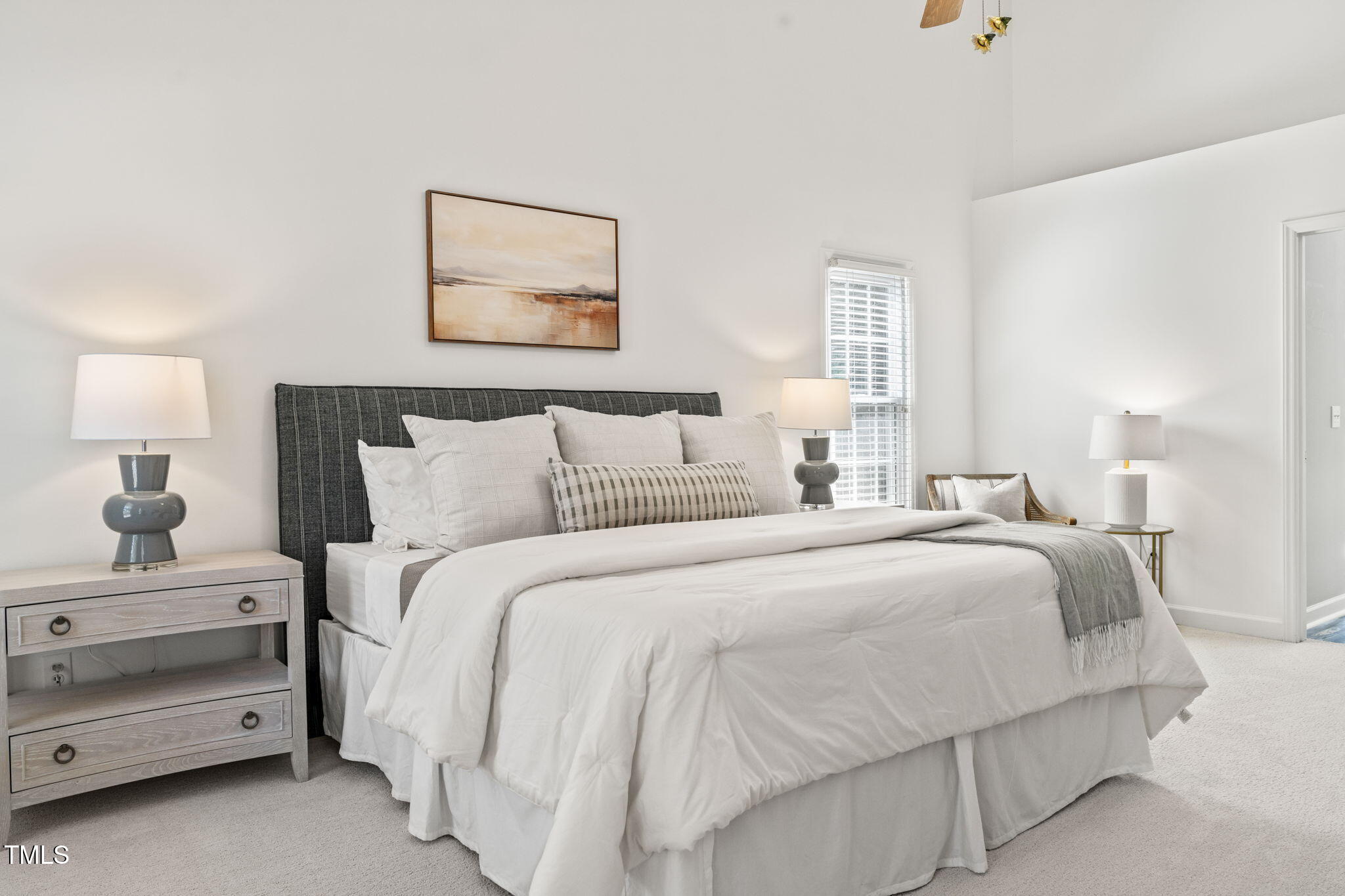 1708 Turtle Ridge Way Raleigh, NC 27614 - Photo 29 of 51 a bedroom with a bed and a lamp on dresser