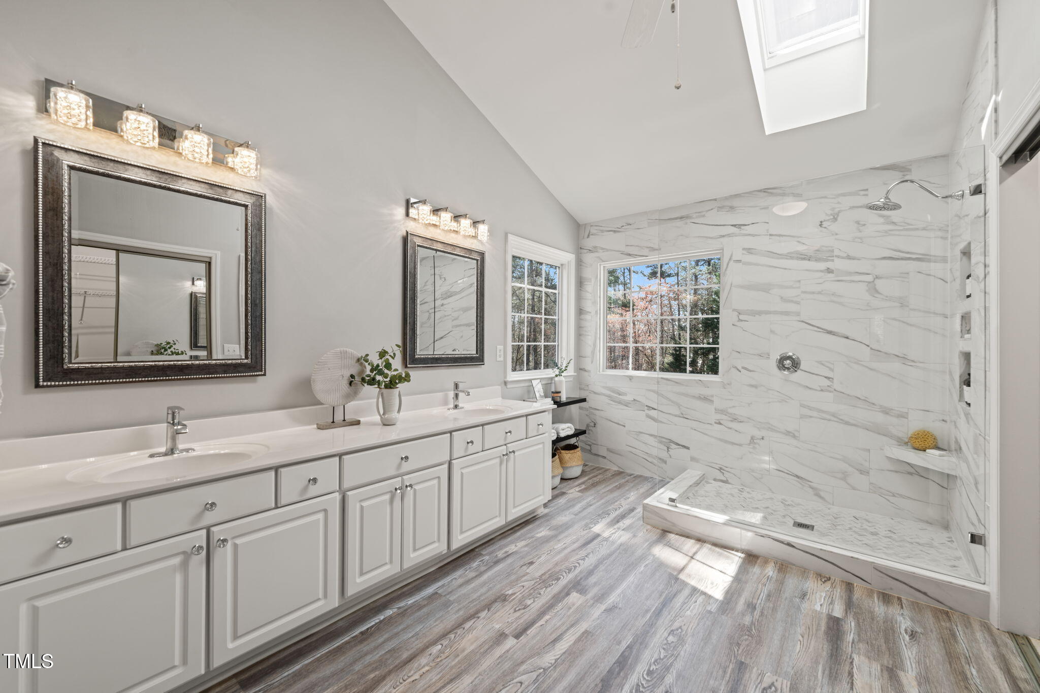 1708 Turtle Ridge Way Raleigh, NC 27614 - Photo 32 of 51 a spacious bathroom with double vanity two mirror and a bathtub