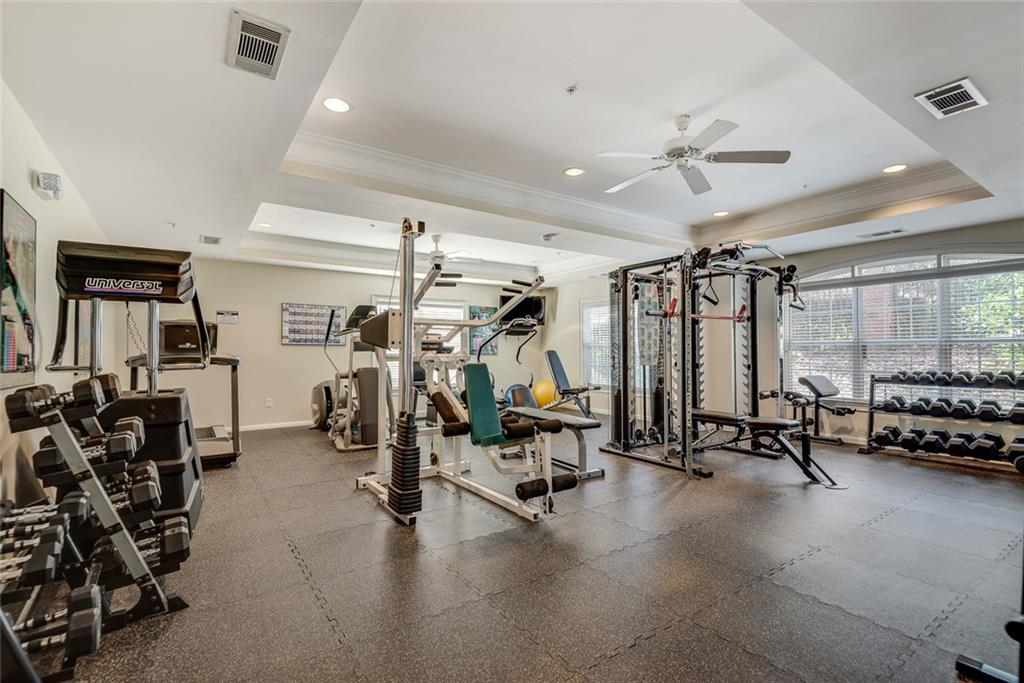 3275 Lenox Road Northeast, Unit 108 Atlanta, GA 30324 - Photo 21 of 22 a view of a room with gym equipment