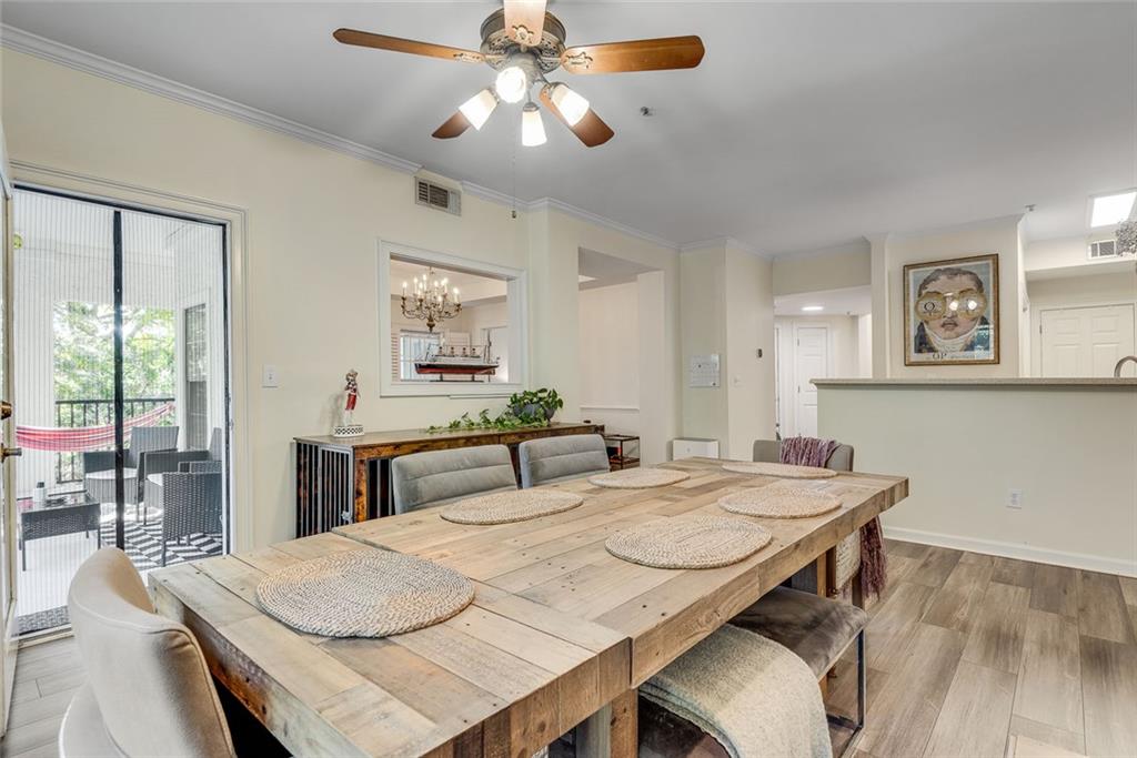 3275 Lenox Road Northeast, Unit 108 Atlanta, GA 30324 - Photo 6 of 22 a view of a dining room with furniture