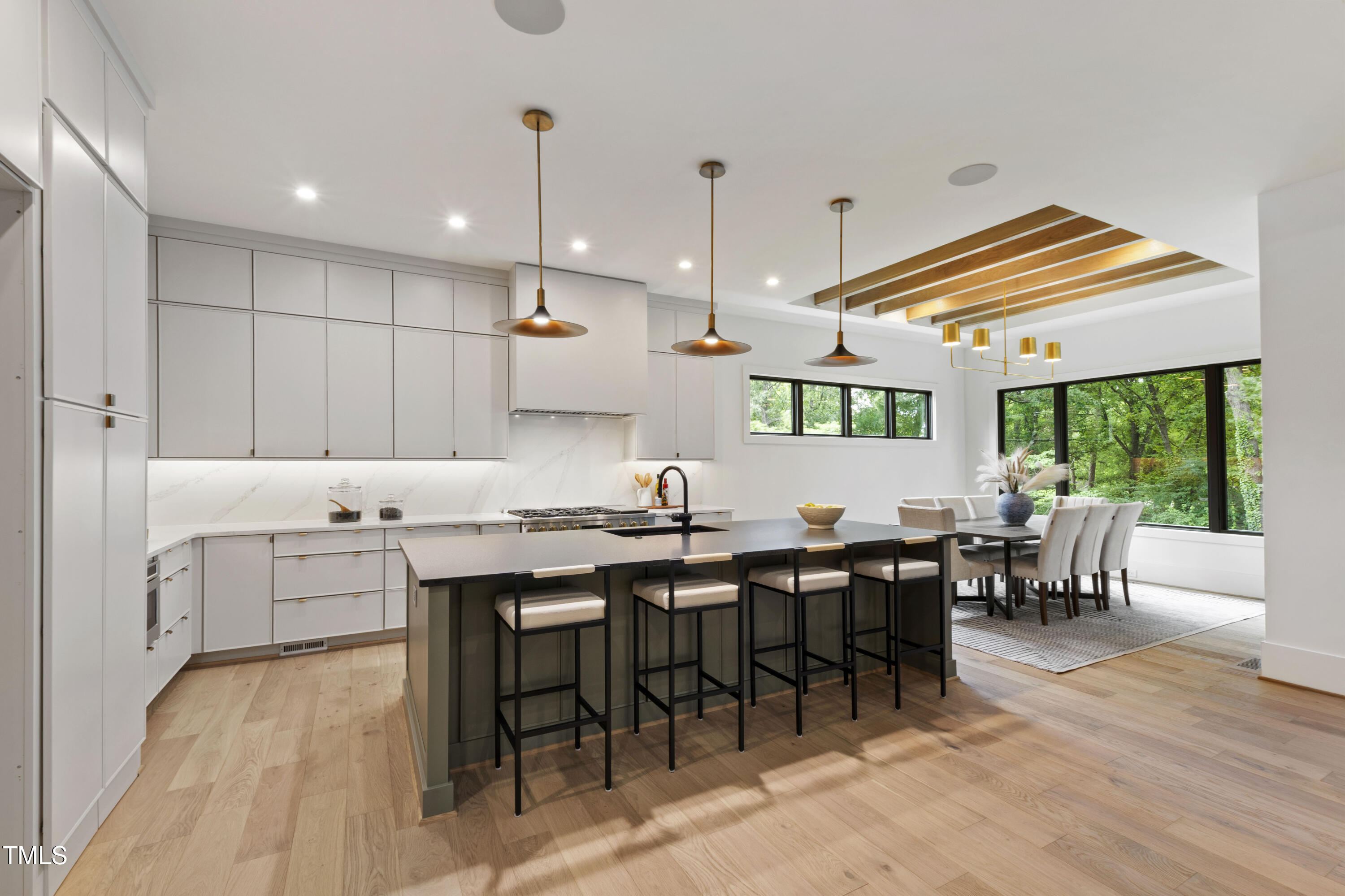 5208 Knollwood Road Raleigh, NC 27609 - Photo 6 of 62 a kitchen with lots of counter top space