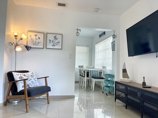 a kitchen with a refrigerator stove and cabinets