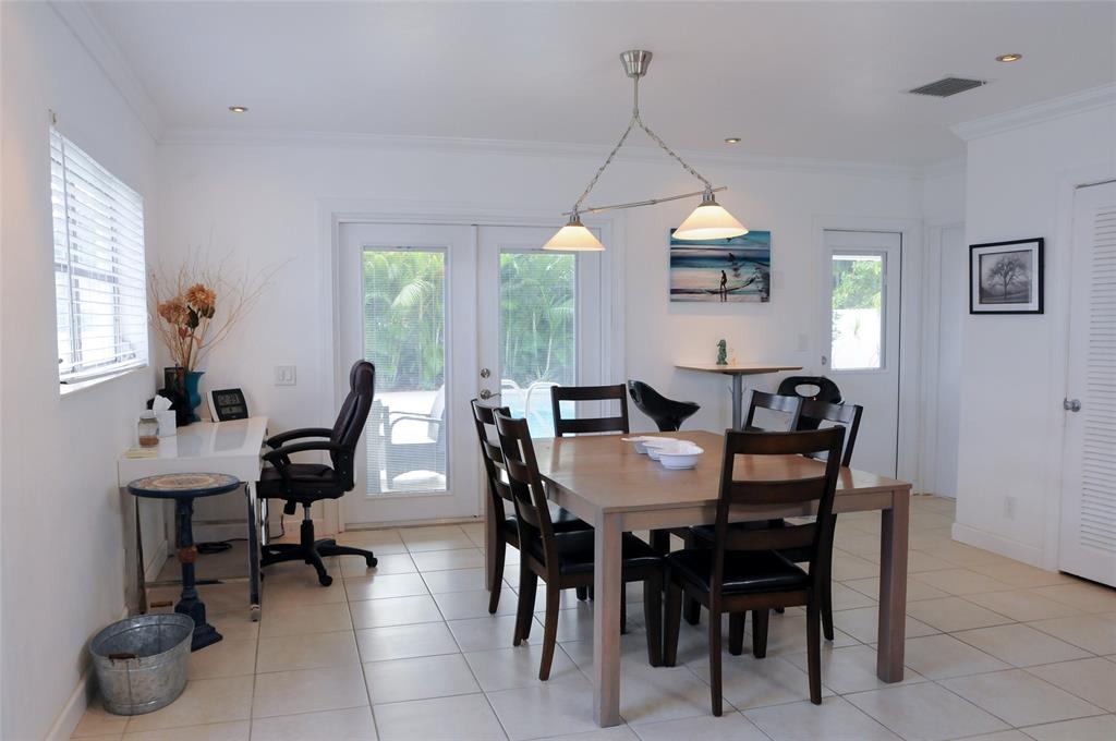 29 Northeast 3rd Street Dania Beach, FL 33004 - Photo 7 of 31 a view of a dining room with furniture