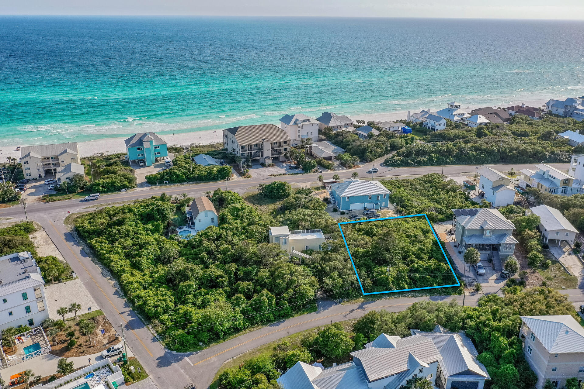 25 A Baird Road Santa Rosa Beach, FL 32459 - Photo 1 of 12 an aerial view of a house with a garden