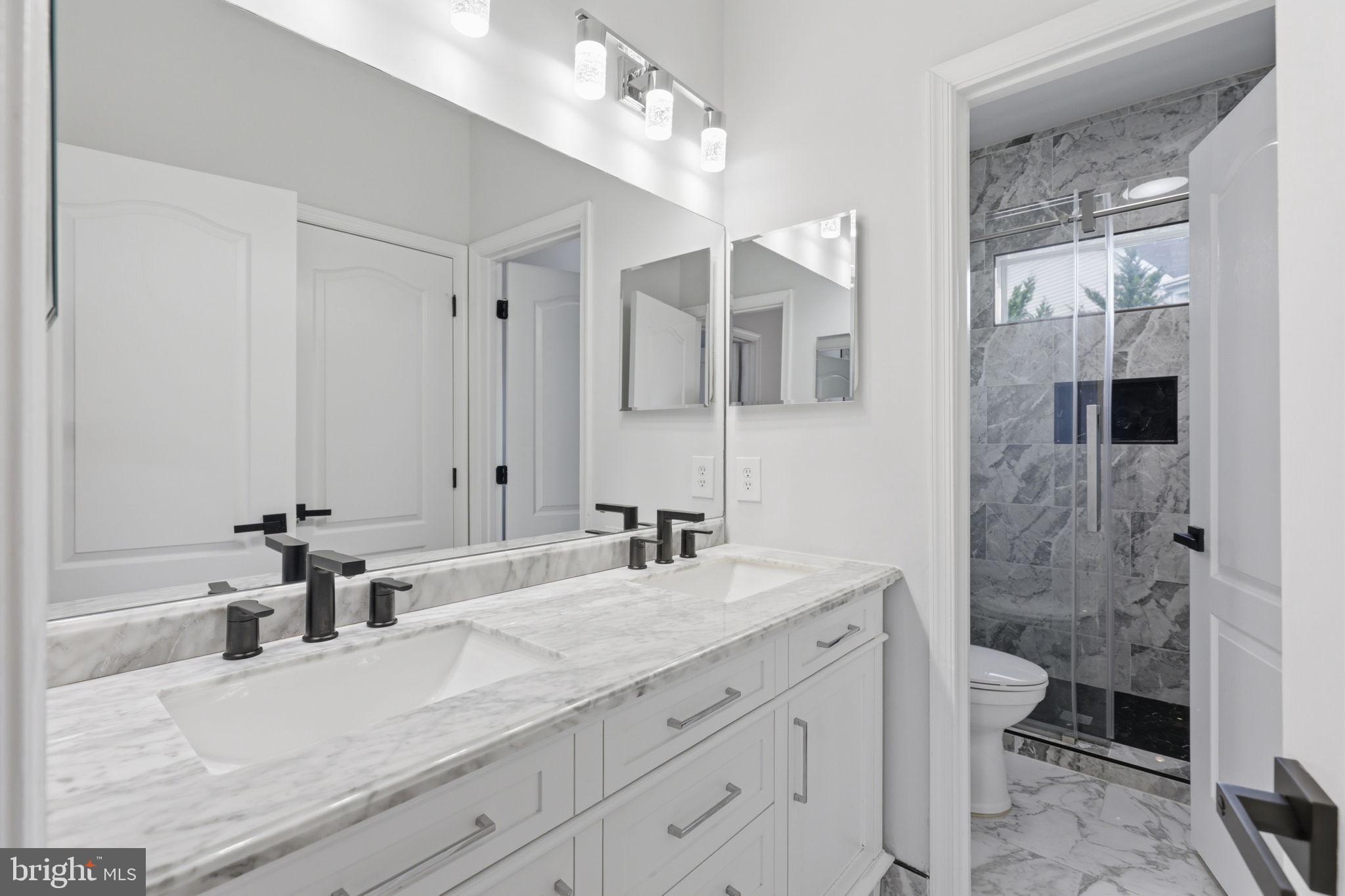 18426 Rim Rock Circle Leesburg, VA 20176 - Photo 30 of 60 Sleek modern bathroom with elegance.