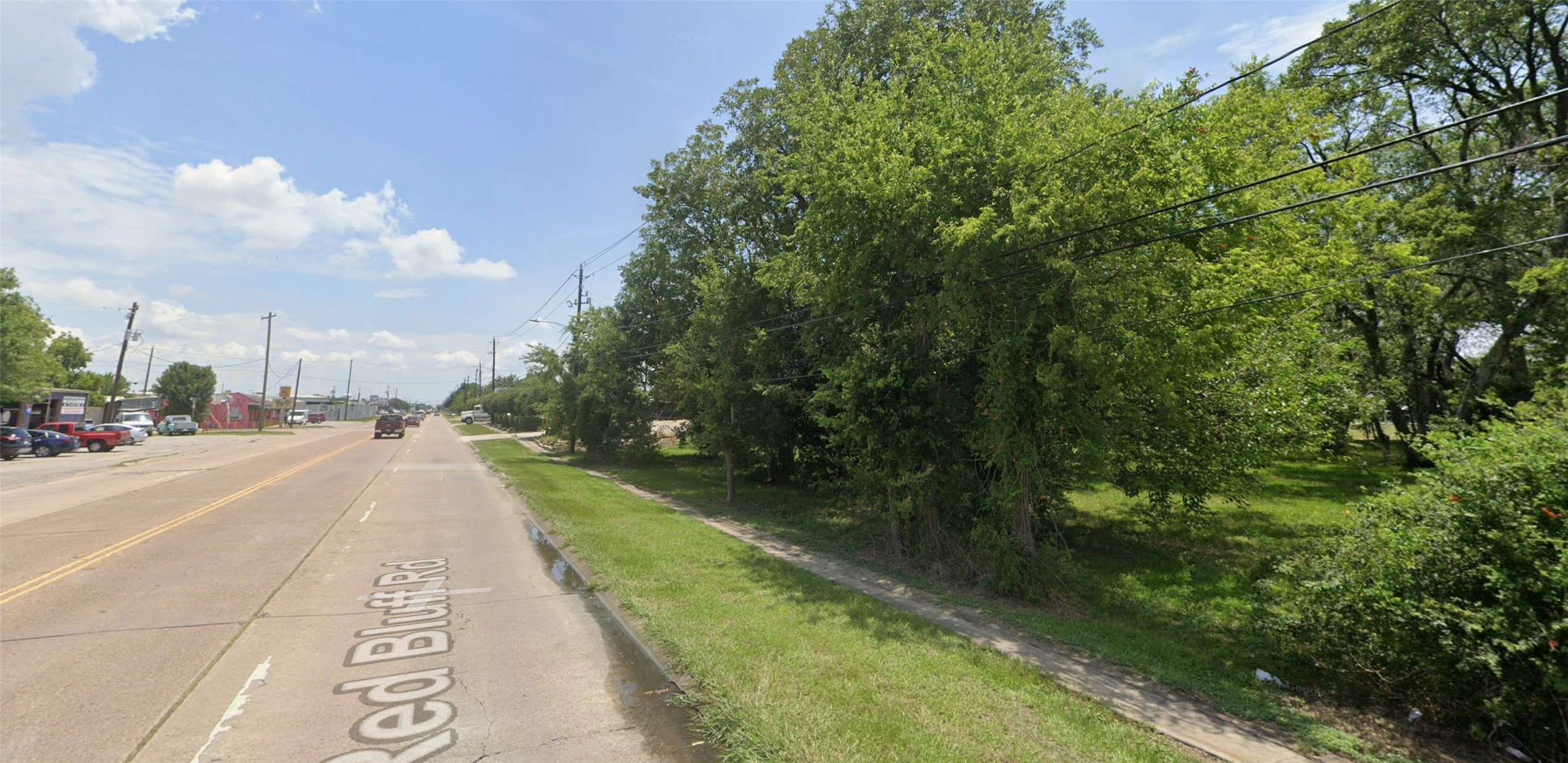 2424 Red Bluff Road Pasadena, TX 77506 - Photo 4 of 7 a view of a street with houses on both side