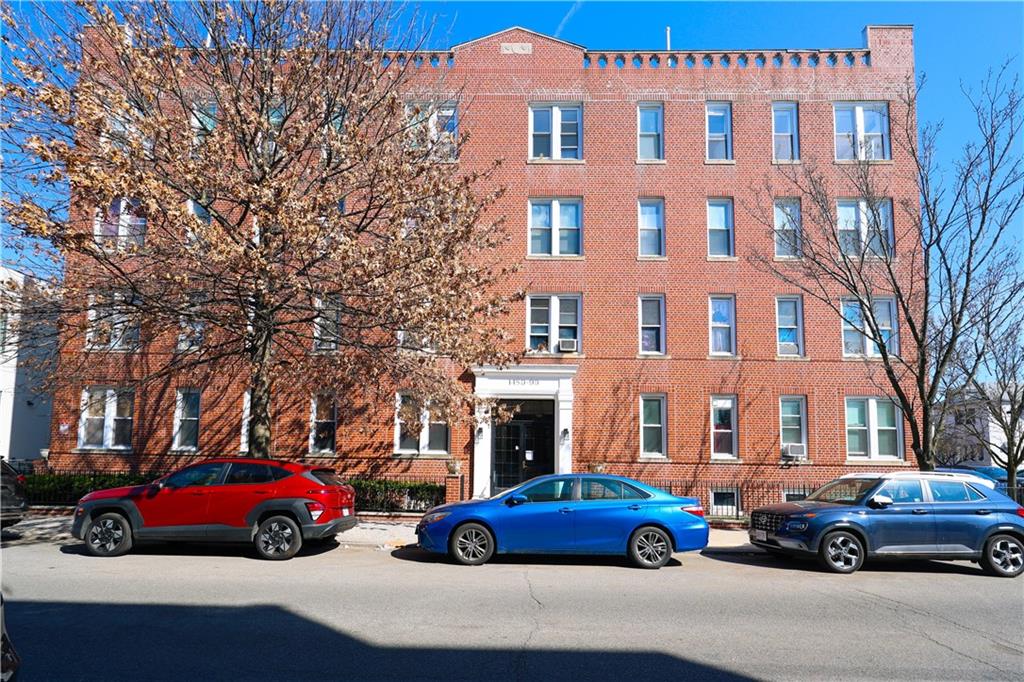 1489 East 8th Street, Unit C2 Brooklyn, NY 11230 - Photo 1 of 15 a car parked in front of a building
