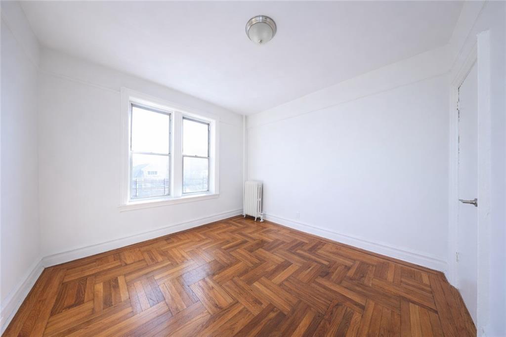 1489 East 8th Street, Unit C2 Brooklyn, NY 11230 - Photo 13 of 15 a view of empty room with window