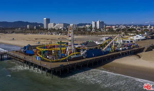 a view of a ocean with nearby beach
