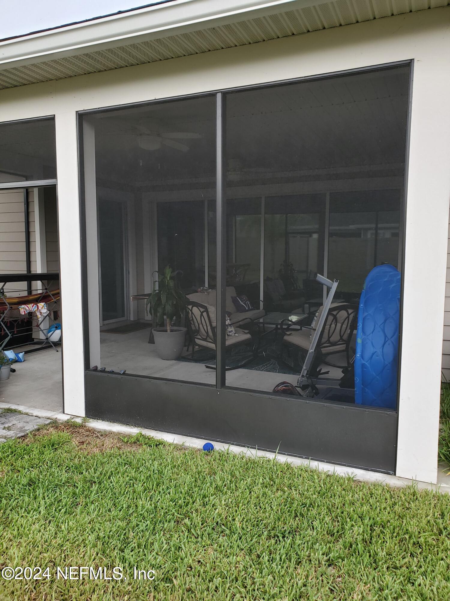 166 Palisade Drive St. Augustine, FL 32092 - Photo 5 of 8 a view of backyard with small cabin