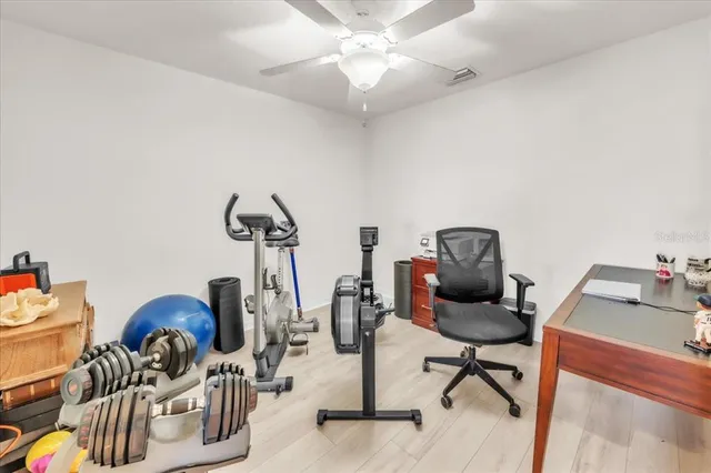 a view of a workspace with furniture