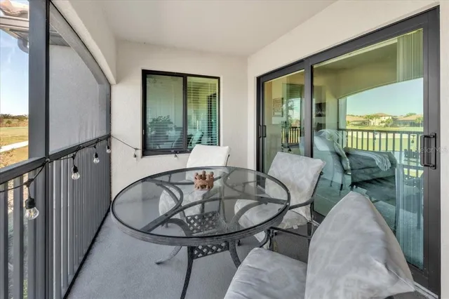 an aerial view of a house with a ocean view