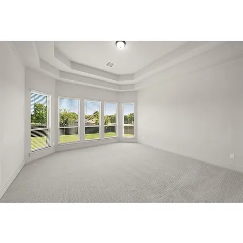 a view of a room with window and wooden floor