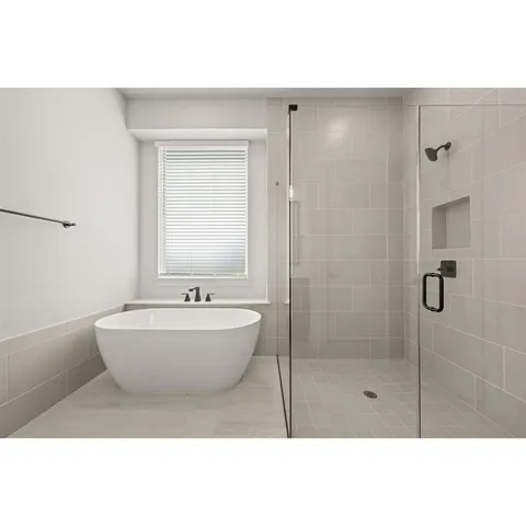 a kitchen with stainless steel appliances kitchen island a sink refrigerator and cabinets