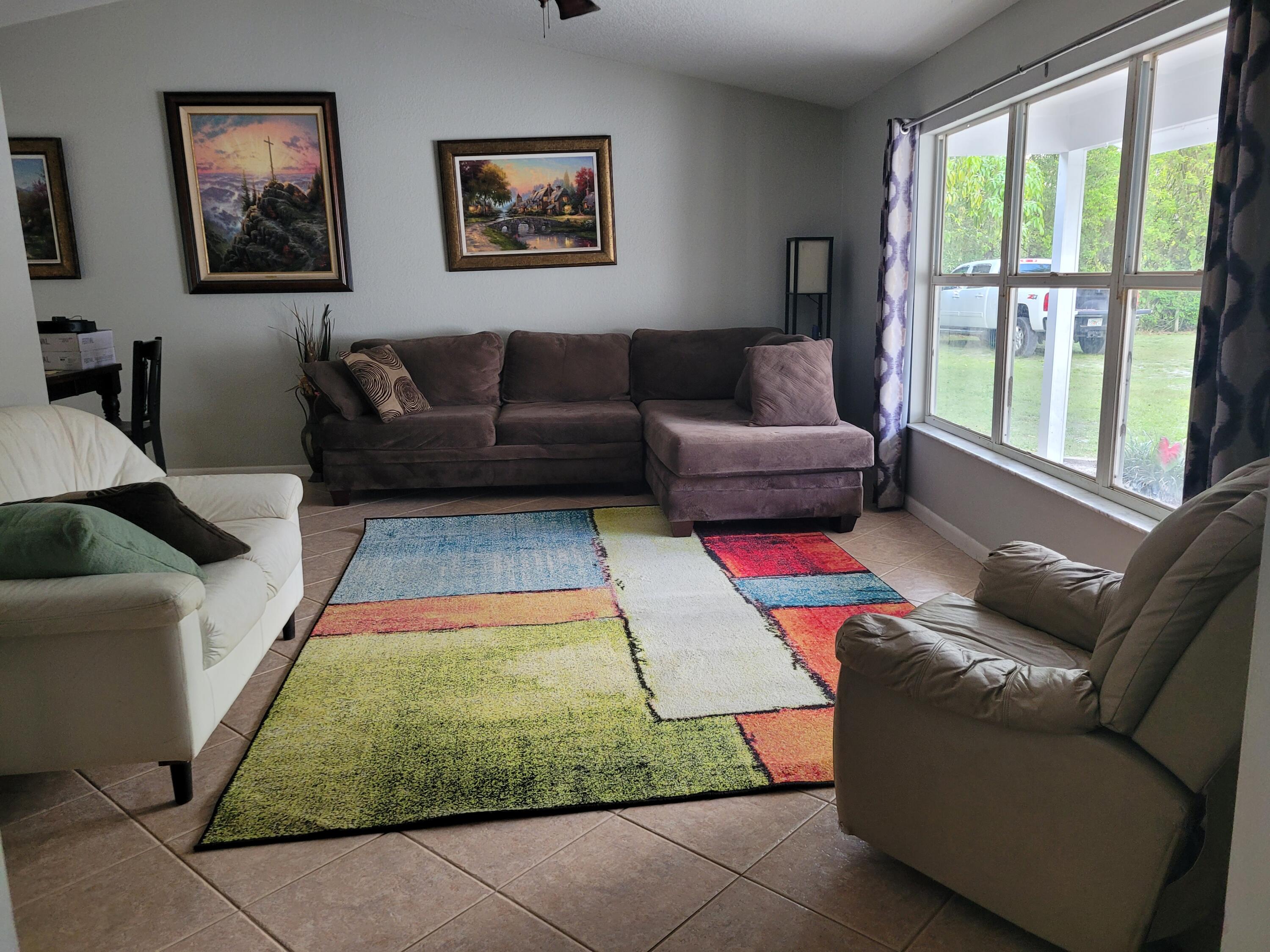 13976 153rd Road North Jupiter, FL 33478 - Photo 10 of 21 Living Room