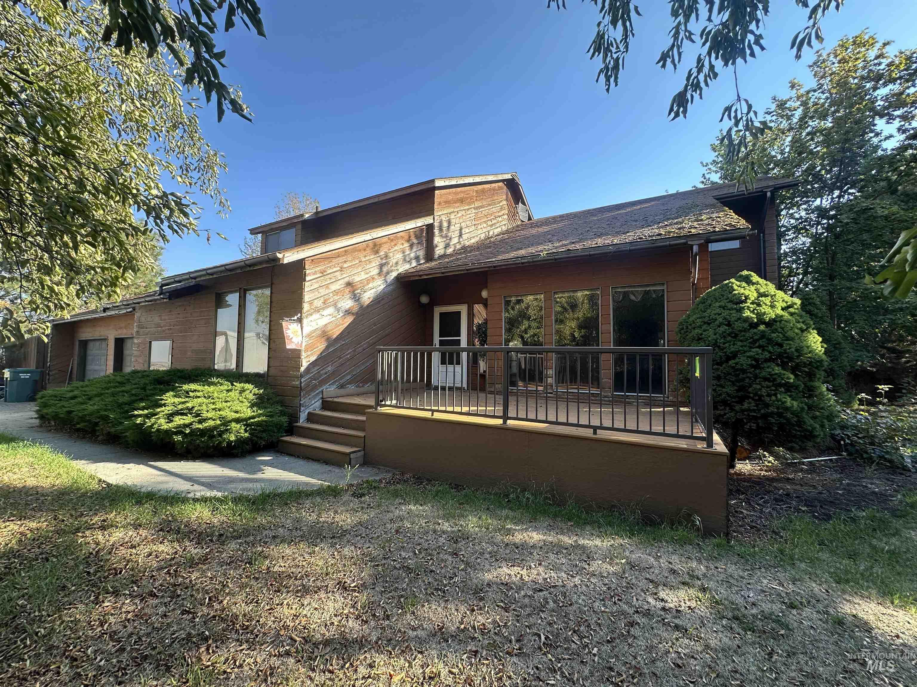 811 Florence Avenue Craigmont, ID 83523 - Photo 1 of 48 Rear view of property with a deck