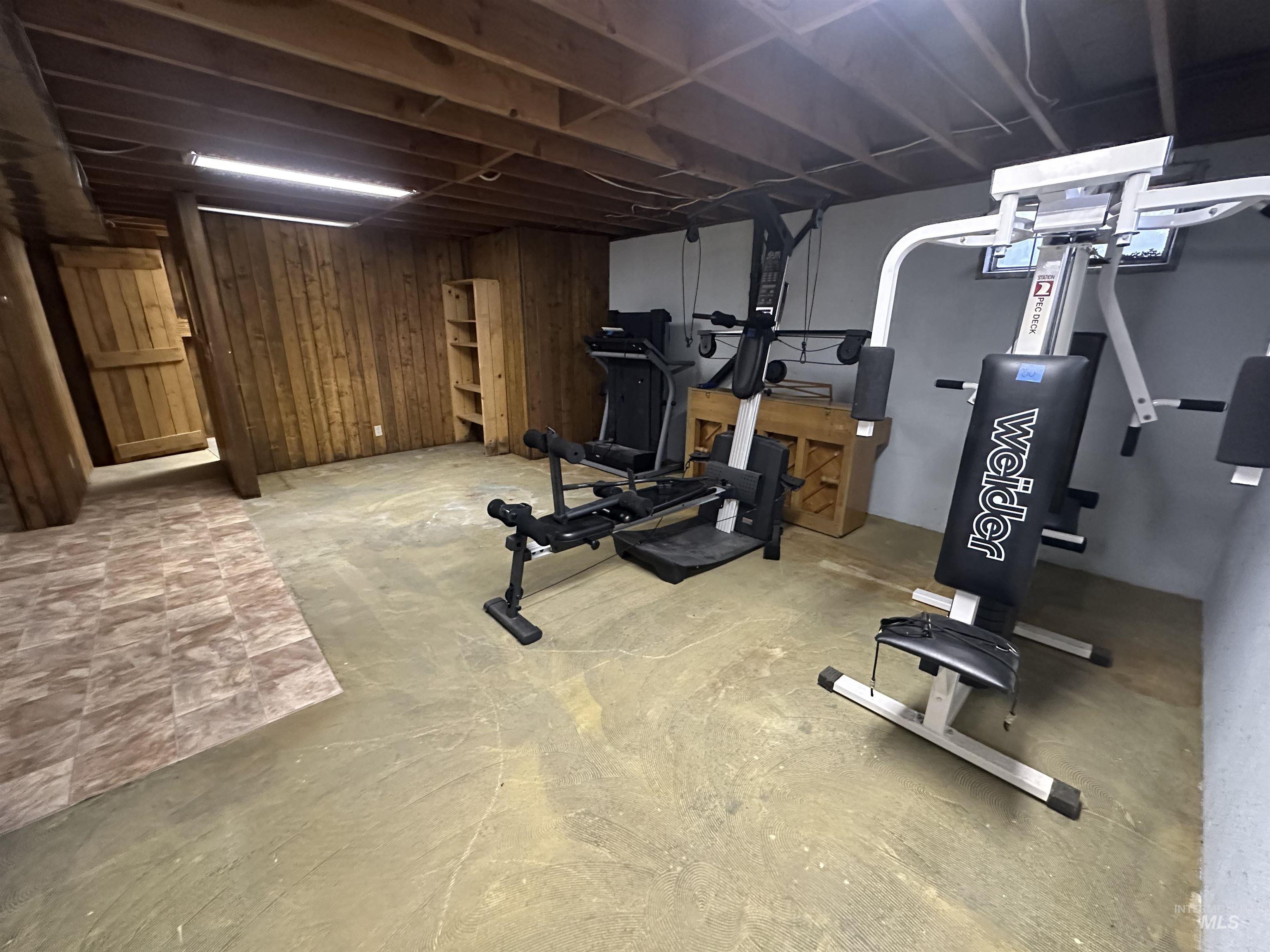 811 Florence Avenue Craigmont, ID 83523 - Photo 18 of 48 Exercise area featuring wood walls