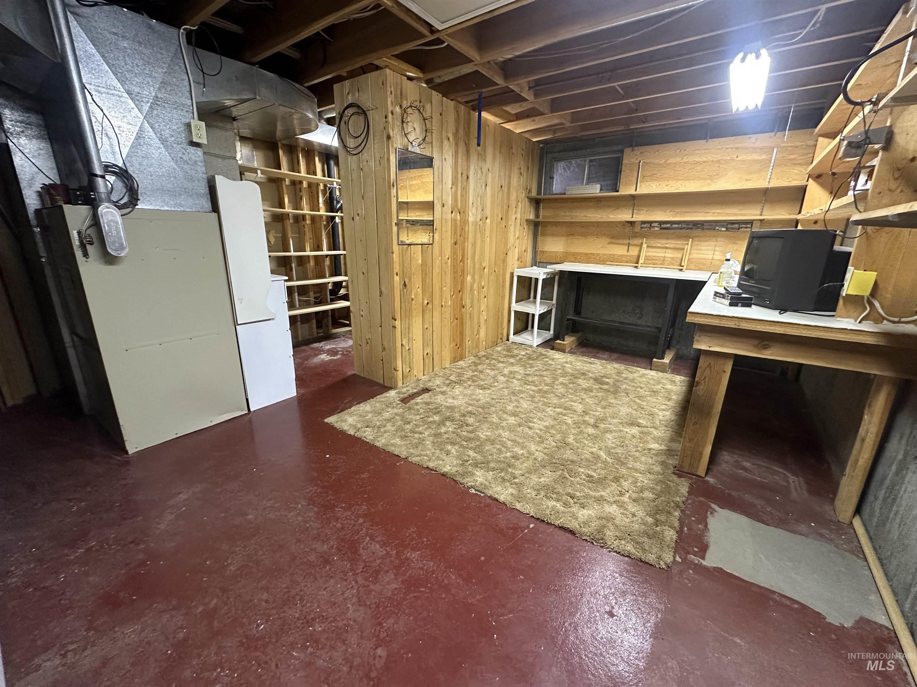 811 Florence Avenue Craigmont, ID 83523 - Photo 23 of 48 Unfinished below grade area featuring a workshop area and heating unit
