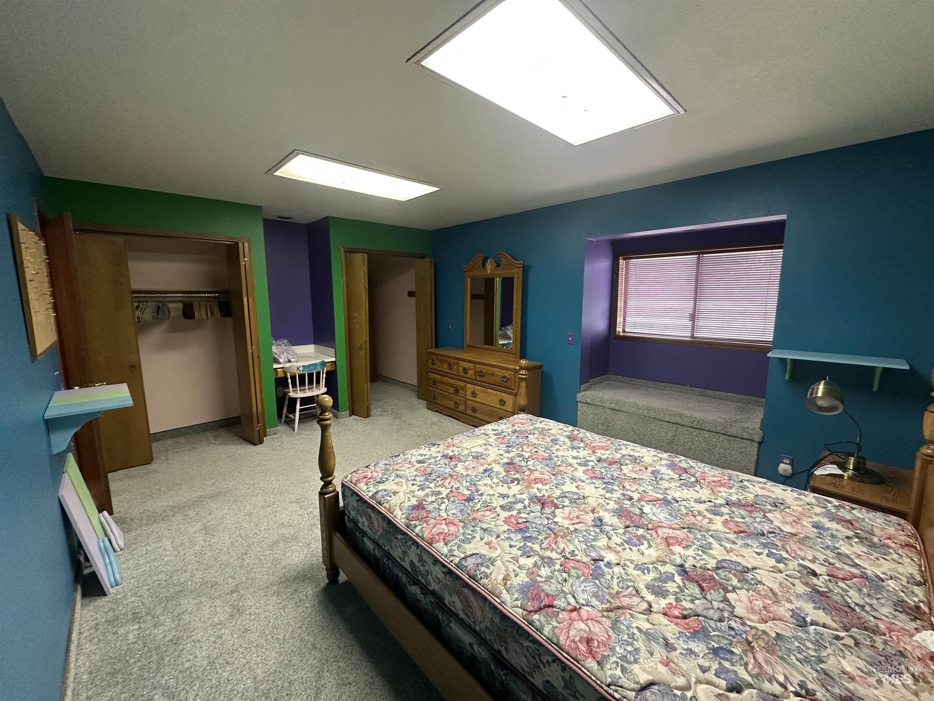 811 Florence Avenue Craigmont, ID 83523 - Photo 30 of 48 Bedroom featuring a closet and carpet flooring