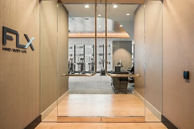 a view of a living room and bathroom