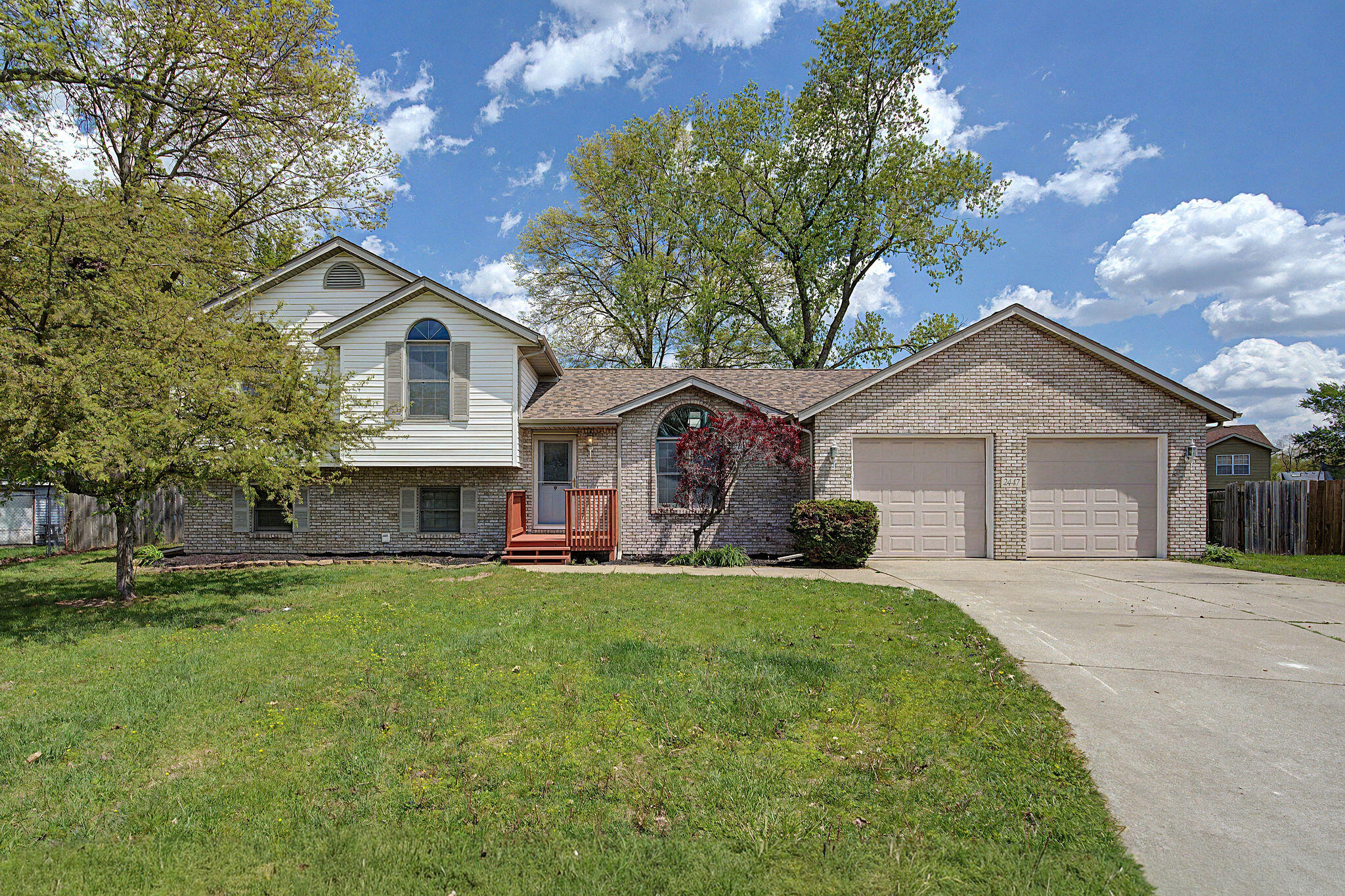 2447 Joseph Avenue Portage, IN 46368 - Photo 1 of 33 a front view of a house with a yard and garage