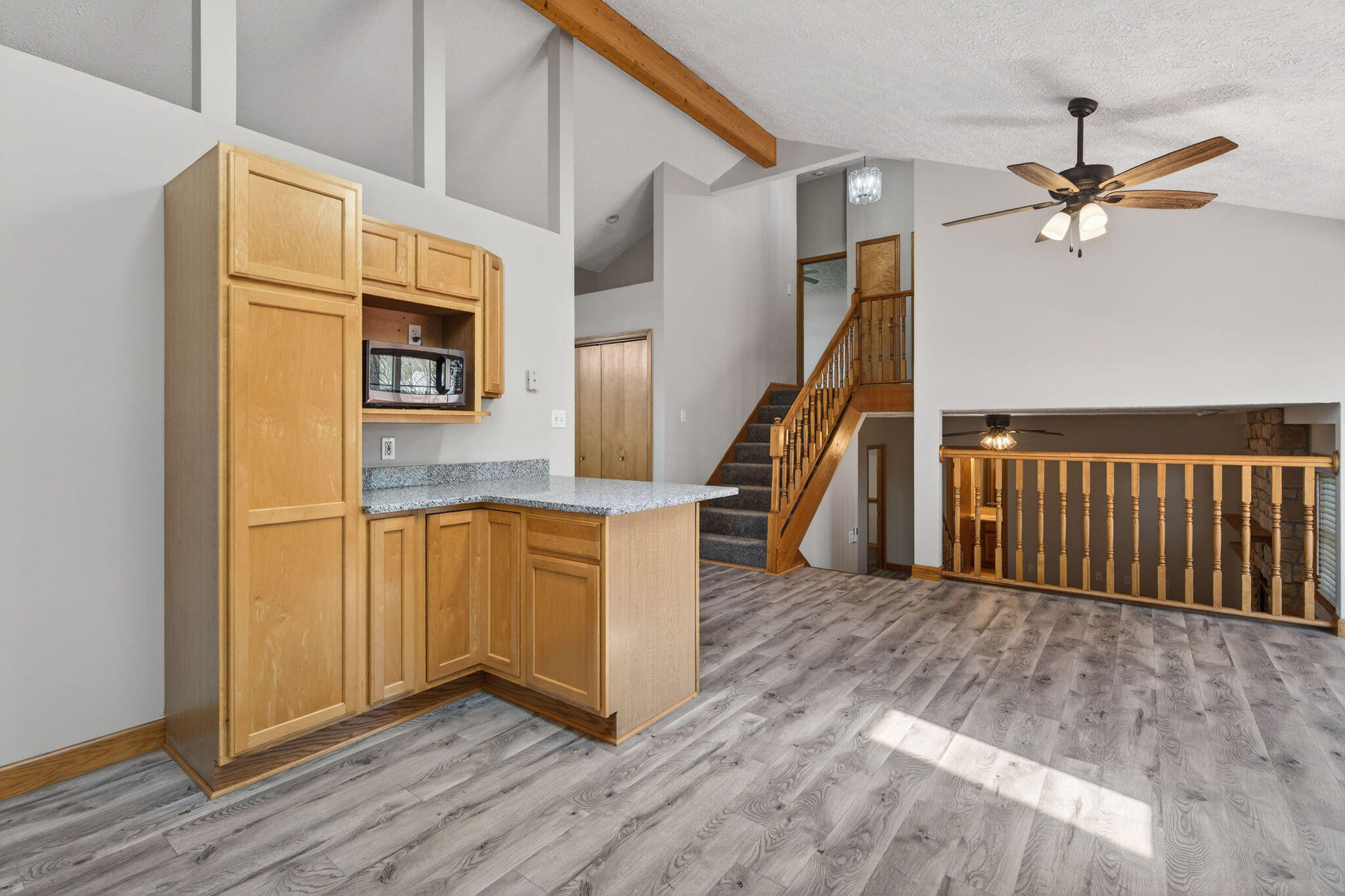 2447 Joseph Avenue Portage, IN 46368 - Photo 11 of 33 a view of a hallway with wooden floor and staircase