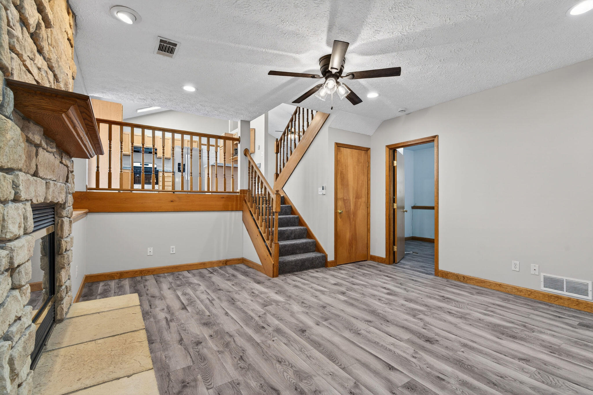 2447 Joseph Avenue Portage, IN 46368 - Photo 21 of 33 a view of empty room with stairs and wooden floor