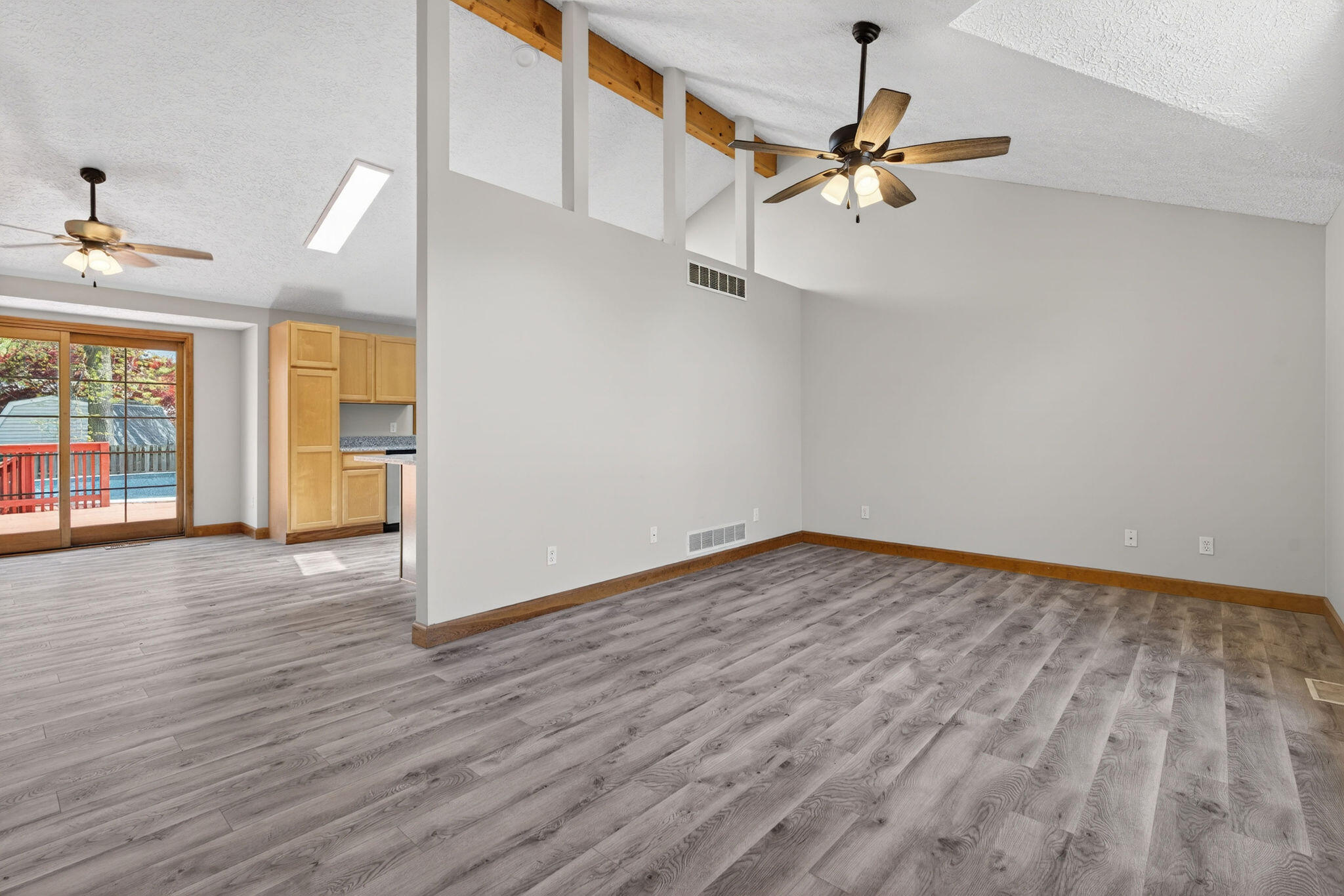 2447 Joseph Avenue Portage, IN 46368 - Photo 4 of 33 wooden floor in an empty room with a window