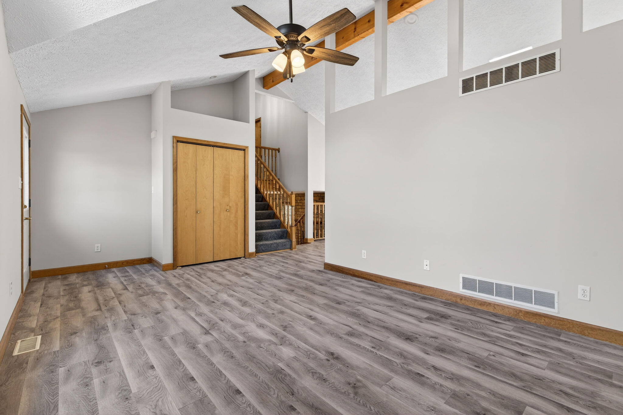 2447 Joseph Avenue Portage, IN 46368 - Photo 5 of 33 a view of an empty room with window and wooden floor