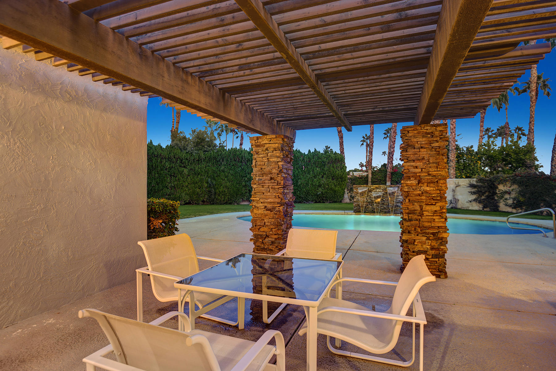 4 Boothill Circle Rancho Mirage, CA 92270 - Photo 11 of 55 Back trelissed patio night